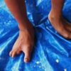Lo's feet.  He is training in Masonry at a facility outside of Ho Chi Minh city.