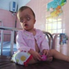Dioxin has shaped this young girl's body into something I cannot fully understand.