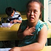 At a center run by VAVA (Vietnam Association for the Victims of Agent Orange) in DaNang, Phoung and classmates learn to embroider.