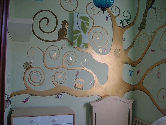 branches of nursery mural tree with monkey, owl, snail paint by the design deli