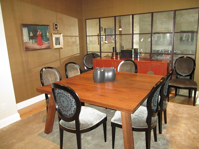 Gold gauze overlay on dining room walls.