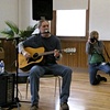 Guitarist performing at Clifton Cultural Arts Center