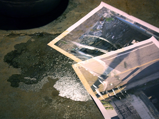 sculpture of photograph in artificial puddle by Rena Leinberger