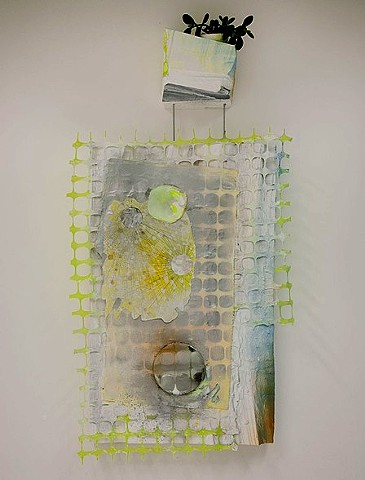 sculptural painting and planter with vanity mirror