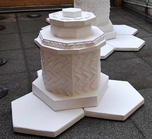 Monument to AD Gordon, outdoor installation including motifs of ancient architecture,agriculture, machines, hebrew folk song and quote for Zionist Labor philosophe A.D. Gordon