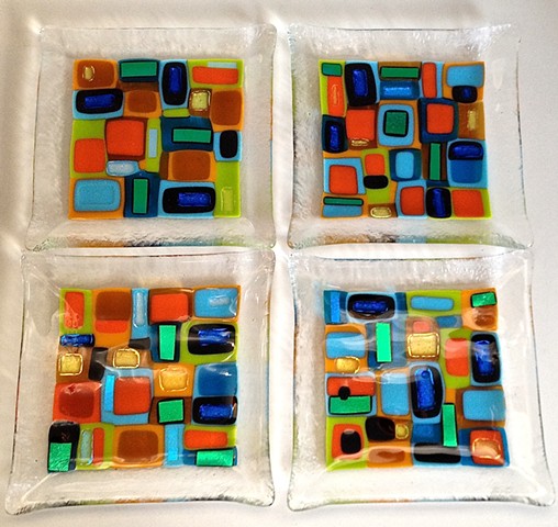 Retro Razzle Dazzle
Details:
They're about 7"x7" from edge to edge, really sturdy, 1/4" thick.
$72 each or the set is $240.