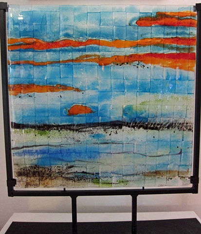 "Sanctuary Sunrise"...
details:
fused glass in sturdy black metal stand
glass is 16" wide x 19.25" tall
$550