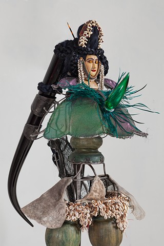 "In Mute Witness at the outskrits and out of center she forms a final creased edge of makeshift settlements, a dark and iridescent thorn of horn pierces all home with the hard and the green of unripe fruit"