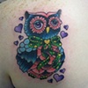 Brittany's girly owl tattoo