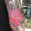 Kevin's elbow hibiscus tattoo