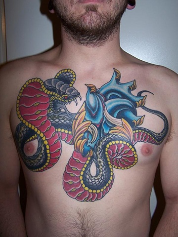 heart cobra chest piece tattoo - anthony filo rochester