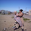Just Enough at the soccer field in Delft Township of Cape Town, South Africa
