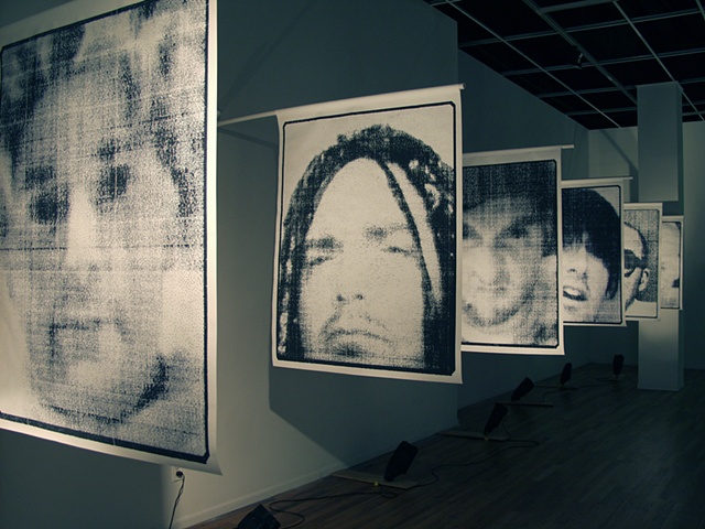 Archival Pigment Prints on Tyvek Banner Paper hung on a PVC poles and plastic flag pole holders.