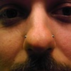 double nostril piercings with 19gauge half-dome nostril screws from Industrial Strength