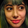 forehead and chest dermal anchors with 4mm clear rhinestones, septum with 16gauge niobium continuous ring, and vertical labret with 16gauge implant-grade titanium curved barbell 
