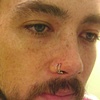 double nostril piercings with 18gauge captive rings from Industrial Strength
