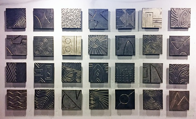 Carved tile mural metallic glazes