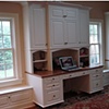 Built-in desk, bookcases, cabinet and window seats. 