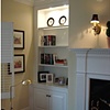 Corner cabinet and mantel.