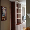 Cherry Corner Built-in with glass shelves.