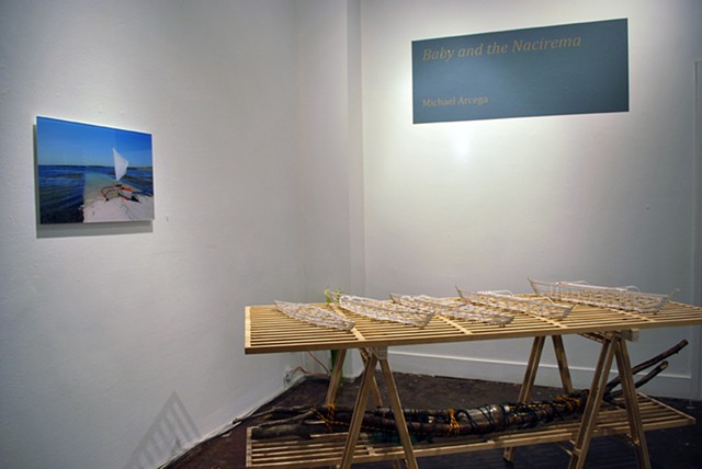 Lexical Borrowing: Saw Horse by the Sea Shore- Understanding Manifest Destiny
2011
Mat board, wood, found plastic bottles, river water, and mixed media
4' x 7' x 3'