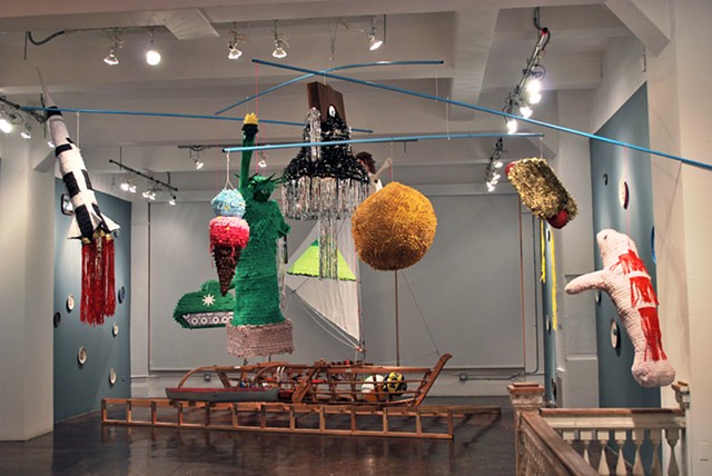 Piñata Mobile
2012
Paper materials, wheat paste, dum-dums, mylar, string, cables, steel, and mixed media.