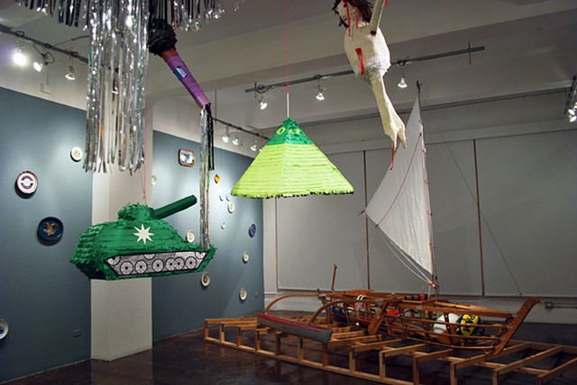 Piñata Mobile
2012
Paper materials, wheat paste, dum-dums, mylar, string, cables, steel, and mixed media.