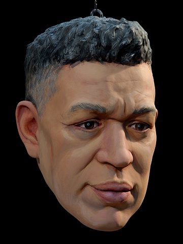 polychrome figurative portrait head of artist Andres Serrano