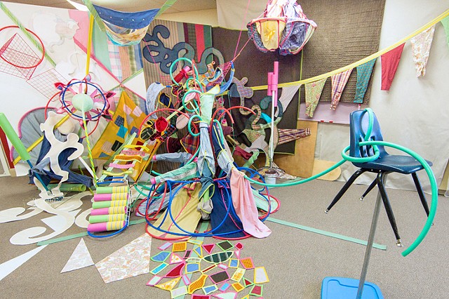 Heather Brammeier painting in space installation shirts used clothing furniture pool noodles