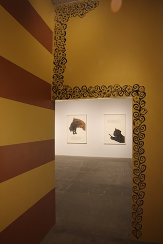 View of doorway with hollyhock/growing tree motif