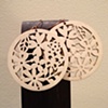 white wooden flower circles