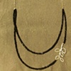 black spinel, gold chain, & leaf 