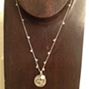 silver lotus flower w/ moonstones - reverse side is "om"