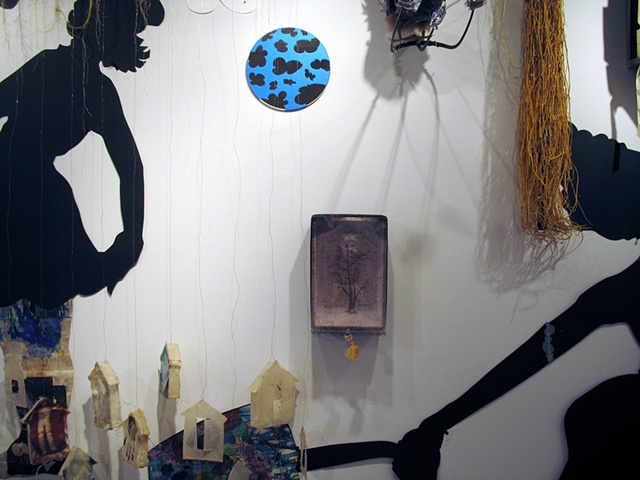 Large sculptural works often based on wall grids - mathematical grids plotted, drawn and then drilled directly into the gallery walls - with a multiplicity of materials and found objects falling into the viewers space to create a three dimensional languag