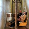Visitors on swinging bench