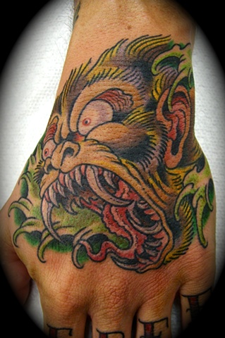 blood water tattoo monkey hand blood water tattoo monkey hand