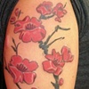 Tatouage par Genevieve-fleurs sur bras
