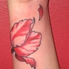 Tatouage p&eacute;tales de fleurs