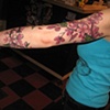 Tatouage fleurs sur bras