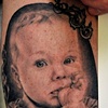 Tatouage portrait jeune enfant