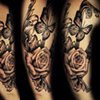 Rose butterfly tattoo