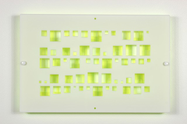 Green and white laser-cut acrylic template with geometric pattern based on pi by Yvette Kaiser Smith