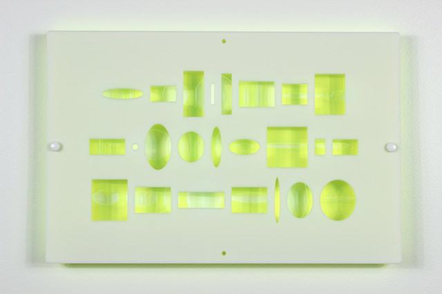 Green and white laser-cut acrylic template with geometric pattern based on pi by Yvette Kaiser Smith