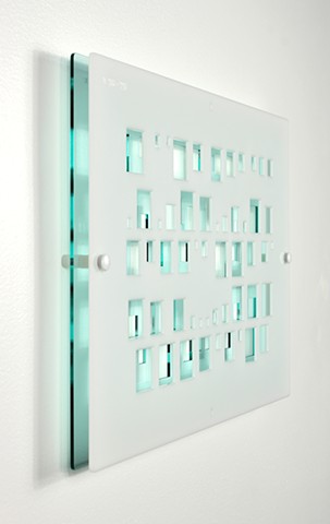 Blue and white laser-cut acrylic template with geometric pattern based on pi by Yvette Kaiser Smith