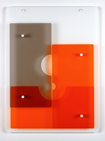Geometric abstraction in laser-cut acrylic, white, brown, and orange.