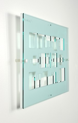 Blue and white laser-cut acrylic template with geometric pattern based on pi by Yvette Kaiser Smith