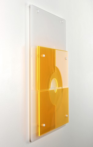 Yellow and white geometric abstraction based on number sequence in laser-cut acrylic.