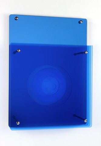 Blue geometric abstraction based on number sequence in laser-cut acrylic.