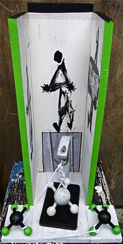 This Modern Assemblage Art piece by Steven Tannenbam of StructureSlash uses acrylic paint, a photo printed out with an inkjet printer on paper, wire, string, thread, and found objects to create a sureal scene