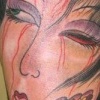 Head with Dagger by Little Chico 2008